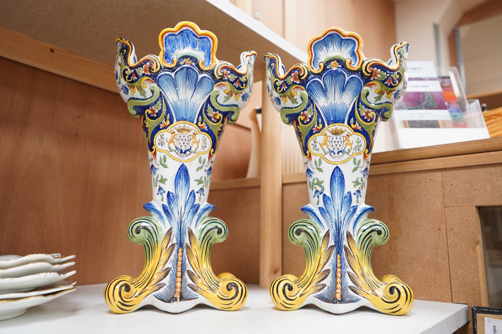 A pair of early 20th century French faience vases, 37cm high